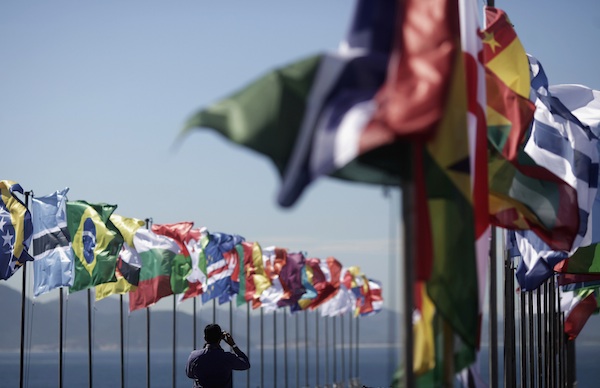 MAN TAKES PICTURE OF NATIONAL FLAGS AHEAD OF U.N. SUMMIT IN BRAZIL