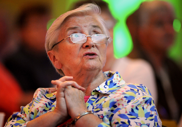 FRANCISCAN SISTER PARTICIPATES IN MORNING PRAYER AT LCWR'S ANNUAL ASSEMBLY IN ST. LOUIS