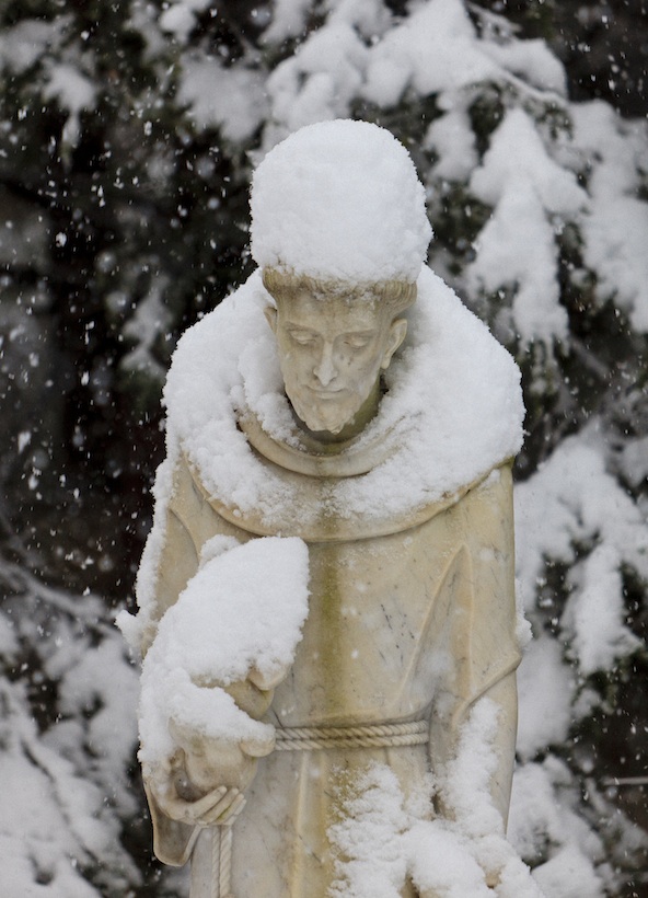 SNOW-COVERED STATUE OF ST. FRANCIS SEEN OUTSIDE NEW JERSEY CHURCH