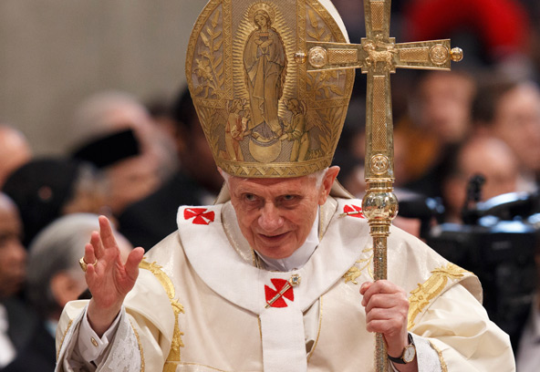 Pope Benedict XVI greets the faithful as he leaves after celebrating Mass on the feast of Mary, Mother of God, in St. Peter's Basilica at the Vatican Jan. 1. (CNS photo/Paul Haring)