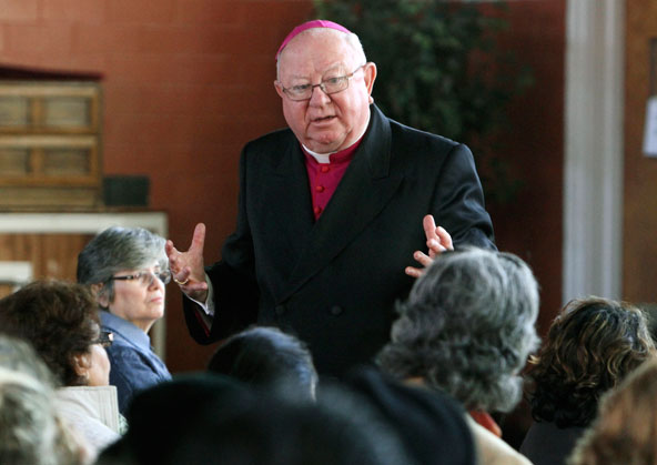 Bishop William F. Murphy of Rockville Centre, N.Y., talks to parishioners of St. Mary of the Isle Church in Long Beach, N.Y., during Mass in the parish auditorium Nov. 4. Bishop Murphy will be the homilist at this year’s Red Mass. (Gregory A. Shemitz/CNS)