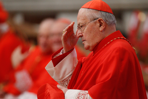 Cardinal Angelo Sodano, dean of the College of Cardinals, makes the sign of the cross during a Mass celebrated by Pope Benedict XVI in St. Peter's Basilica at the Vatican in this Nov. 21, 2010, file photo. Cardinal Sodano has the responsibility to make p reparations for the papal conclave to elect Pope Benedict XVI's successor. The pope announced his resignation Feb. 11. (CNS photo/Paul Haring)