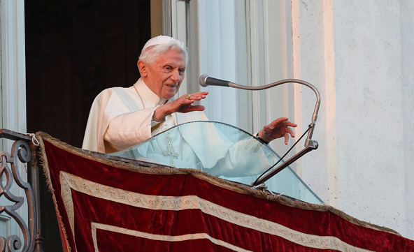 Pope Benedict XVI greets a crowd gathered for his arrival in Castel Gandolfo, Italy, Feb. 28. It was his final public appearance before he drew to a close his papacy. "I am a simple pilgrim who begins the last stage of his pilgrimage on this earth," he s aid. (CNS photo/Paul Haring)