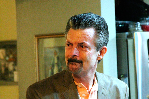 Deacon Jim Mickens, reacts to words of gratitude from members of Phoenix's Catholic Retreat for Young Singles group for his years of service. (Ambria Hammel/CATHOLIC SUN)