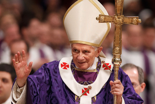Pope Benedict XVI carries his pastoral staff as he leaves after celebrating Ash Wednesday Mass in St. Peter’s Basilica at the Vatican Feb. 13. The pope announced Feb. 11 that he will resign. (Paul Haring/CNS)