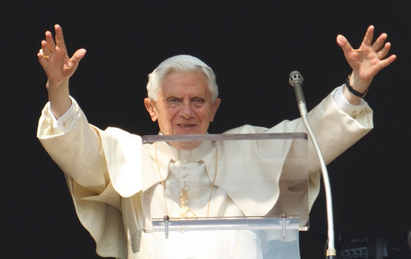 Pope Benedict XVI waves as he arrives to lead the Angelus from the window of his apartment overlooking St. Peter's Square at the Vatican Feb. 17. (CNS photo/Paul Haring)
