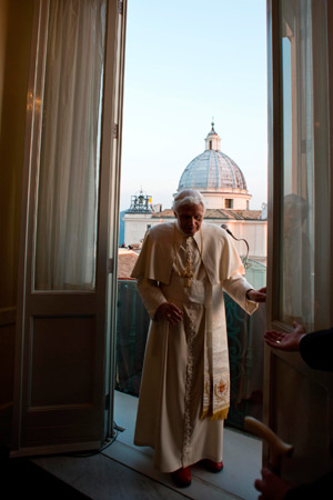 Pope Benedict XVI leaves after appearing for the last time at the balcony of his summer residence in Castel Gandolfo, Italy, Feb. 28. It was his final public appearance before his papacy. (CNS photo/L'Osservatore Romano via Reuters)