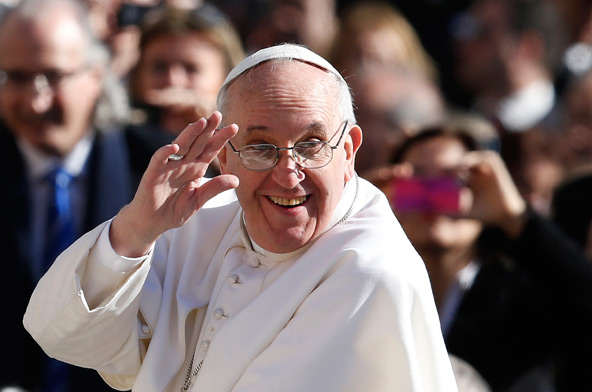 Pope Francis greets the crowd before celebrating his inaugural Mass in St. Peter's Square at the Vatican March 19. (CNS photo/Paul Haring)