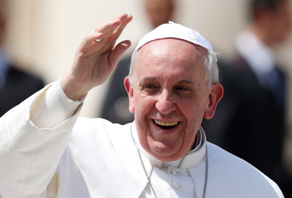Pope Francis greets the crowd as he leaves his general audience in St. Peter's Square at the Vatican April 24. (CNS photo/Paul Haring)