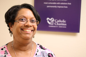 Pat Bell has been taking in unaccompanied minors through Catholic Charities foster care program for several years. She's seen here in the Catholic Charities Phoenix office. (J.D. Long-Garcia/CATHOLIC SUN)