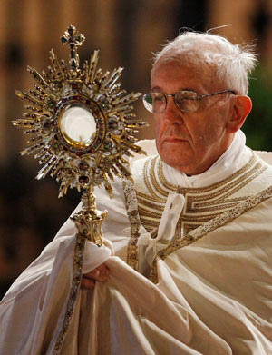 Pope Francis leads the Benediction outside the Basilica of St. Mary Major at the conclusion of the Corpus Christi procession in Rome May 30. (CNS photo/Paul Haring)