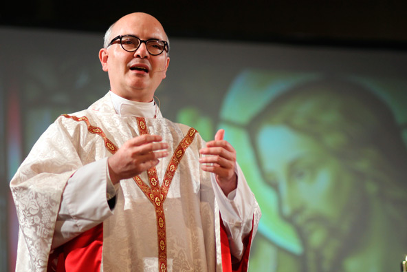 Fr. José Antonio Fortea delivers a homily to a crowd of 2,500 during a May 30 Mass celebrated by Auxiliary Bishop Eduardo A. Nevares at the Phoenix Convention Center (J.D. Long-Garcia/CATHOLIC SUN)