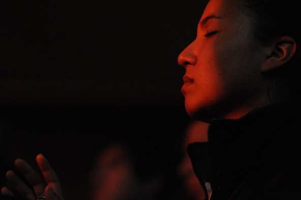 A World Youth Day pilgrim prays during a eucharistic adoration service in Rio de Janeiro July 24. (CNS photo/Emily M. Albert, The Catholic Witness)
