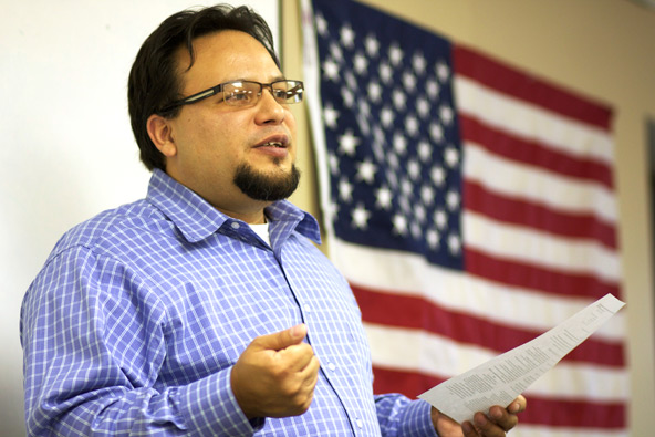 Ruben gives legal tips to those taking the Crosiers citizenship class July 13. (J.D. Long-García/CATHOLIC SUN)