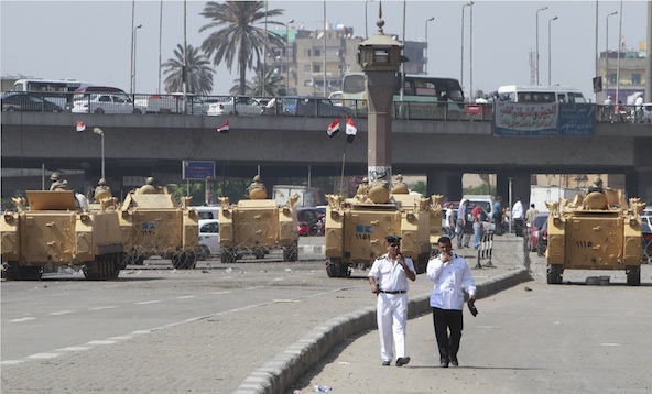 Egyptian army soldiers and armored personnel carriers are positioned near Tahrir Square in Cairo August 19. In an Aug. 18 statement, Coptic Catholic Patriarch Ibrahim Isaac Sedrak urged the country's Catholics to strongly support