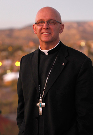 Bishop James S. Wall of Gallup, N.M., is pictured outside his residence in Gallup Oct. 20, 2011. The bishop heads a diocese that covers more than 55,000 square in northwestern New Mexico and northeastern Arizona, serves close to 62,000 Catholics out of a total population of about 495,000, and is home to seven Native American tribes. (CNS photo/Bob Roller)
