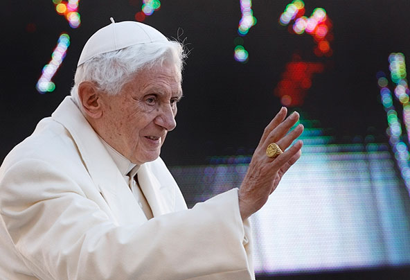 Pope Benedict XVI waves as he arrives to lead his final general audience in St. Peter's Square at the Vatican Feb. 27. (CNS photo/Paul Haring)