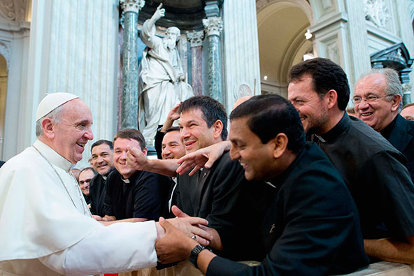 Pope Francis is greeted by priests of the Diocese of Rome during his visit to the Basilica of St. John Lateran in Rome Sept. 16. (CNS photo/L'Osservatore Romano via Reuters)