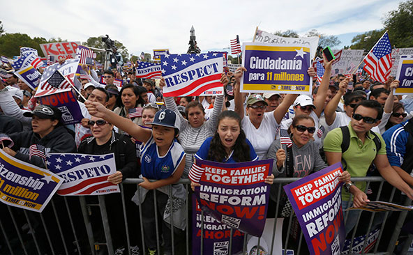 Hundreds of protesters calling for comprehensive immigration reform gather at a rally on the National Mall in Washington Oct. 8. The demonstration was called "Camino Americano: March for Dignity and Respect." (CNS photo/Jason Reed, Reuters)