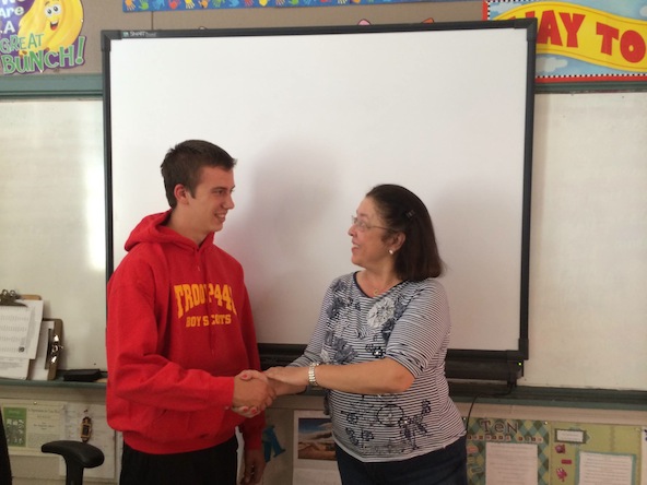 Gena McGowan, right, principal of St. Matthew Catholic School, thanks Alex Bussoletti, a student at Notre Dame Preparatory and parishioner at St. Patrick in Scottsdale, for coordinating an Eagle Scout Project that beneiftted half of St. Matthew classrooms. (photo from St. Matthew's Facebook page)