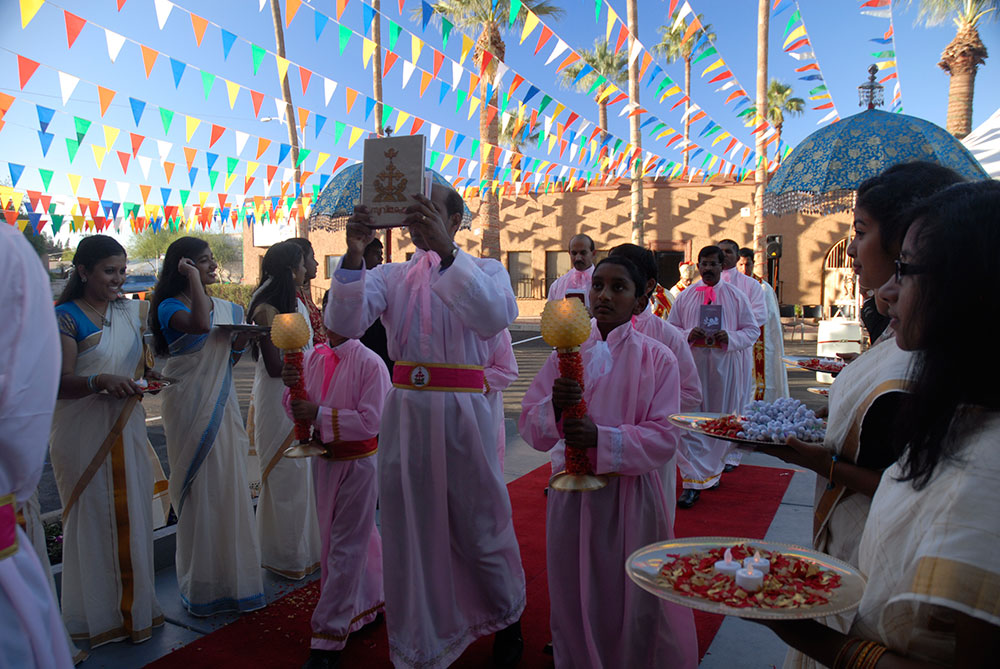 Syro-Malabar Catholics, who trace their roots to the preaching of St. Thomas the Apostle in India, watch as clergy process into the newly dedicated Holy Family Church in Phoenix Nov. 2. (Tamara Tirado/CATHOLIC SUN)