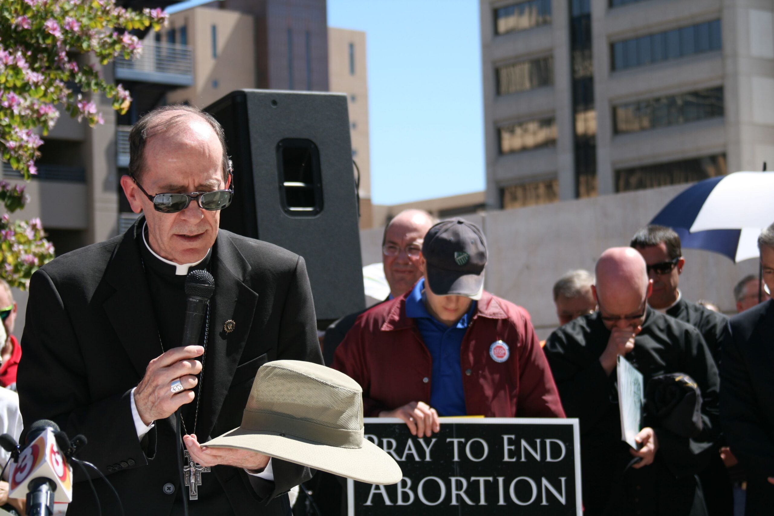 Bishop Olmsted leads prayer during a religious freedom rally at the Sandra Day O'Connor Courthouse in Phoenix.