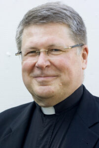 Fr. Jan Michael Joncas, a priest of the Archdiocese of St. Paul and Minneapolis, has composed more than 300 liturgical songs, but he is widely known for the one that tops a list of favorites: "On Eagle'­s Wings." Fr. Joncas is pictured in a 2009 photo. (CNS photo/courtesy Catholic Spirit)