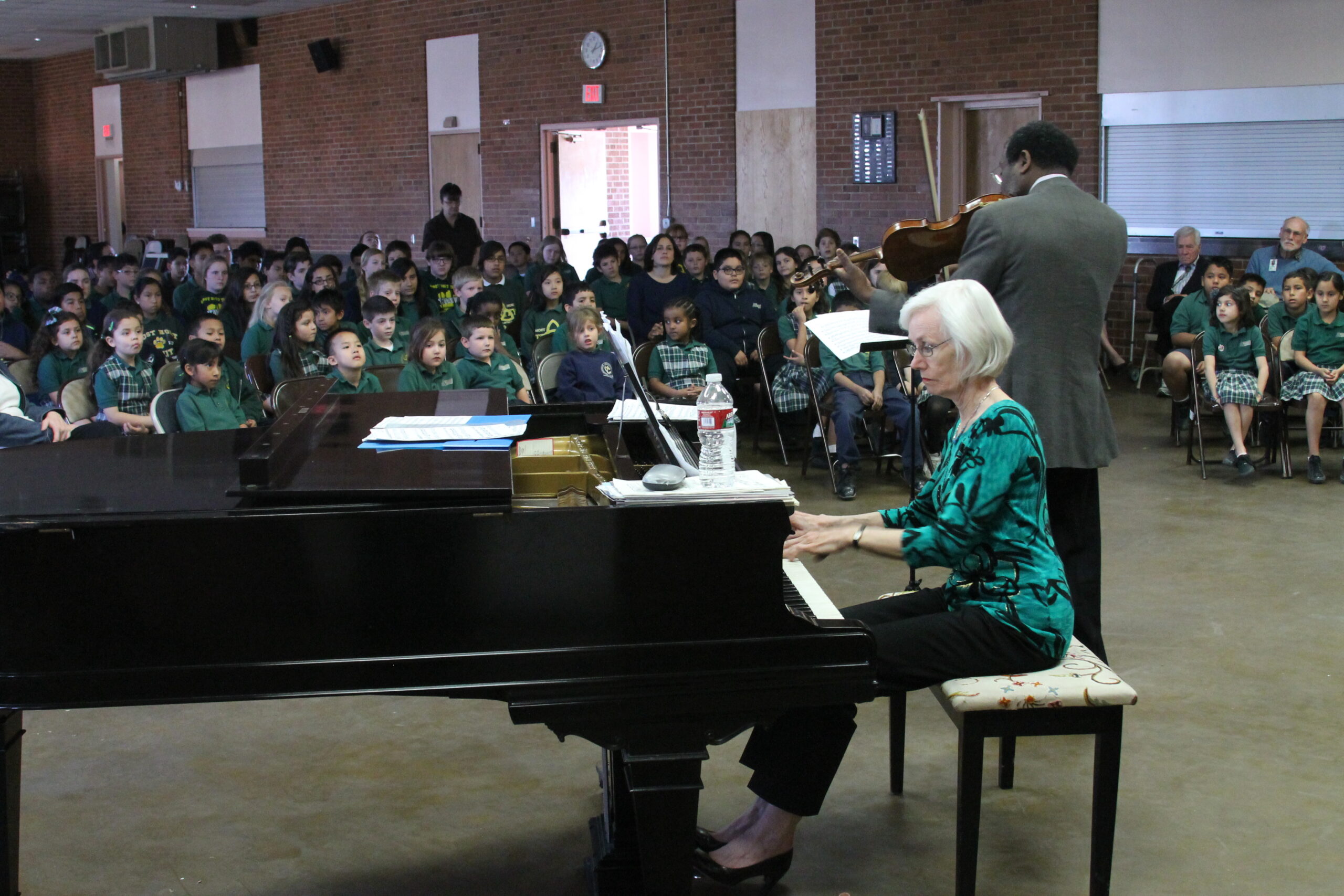 Doris Stevenson, a pianist who has soloed with the Boston Pops, played at Carnegie Hall in New York and other places of distinction, called Most Holy Trinity School's new piano “a masterful instrument” that should be in the sanctuary. (Ambria Hammel/CATHOLIC SUN)