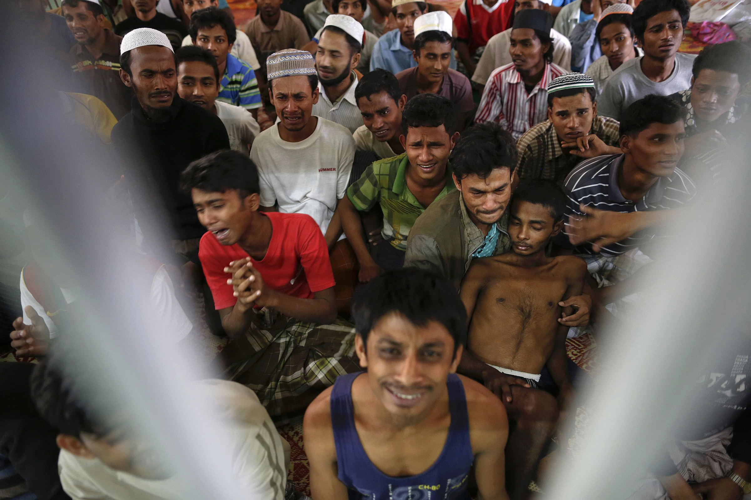 Human trafficking victims from Myanmar are held in a detention cell near the Thailand-Malaysian border, Feb. 13. Pope Francis has raised the blight of human trafficking onto the global stage, calling it "a crime against humanity" and decrying the world's indifference. (CNS photo/Damir Sagolj, Reuters)