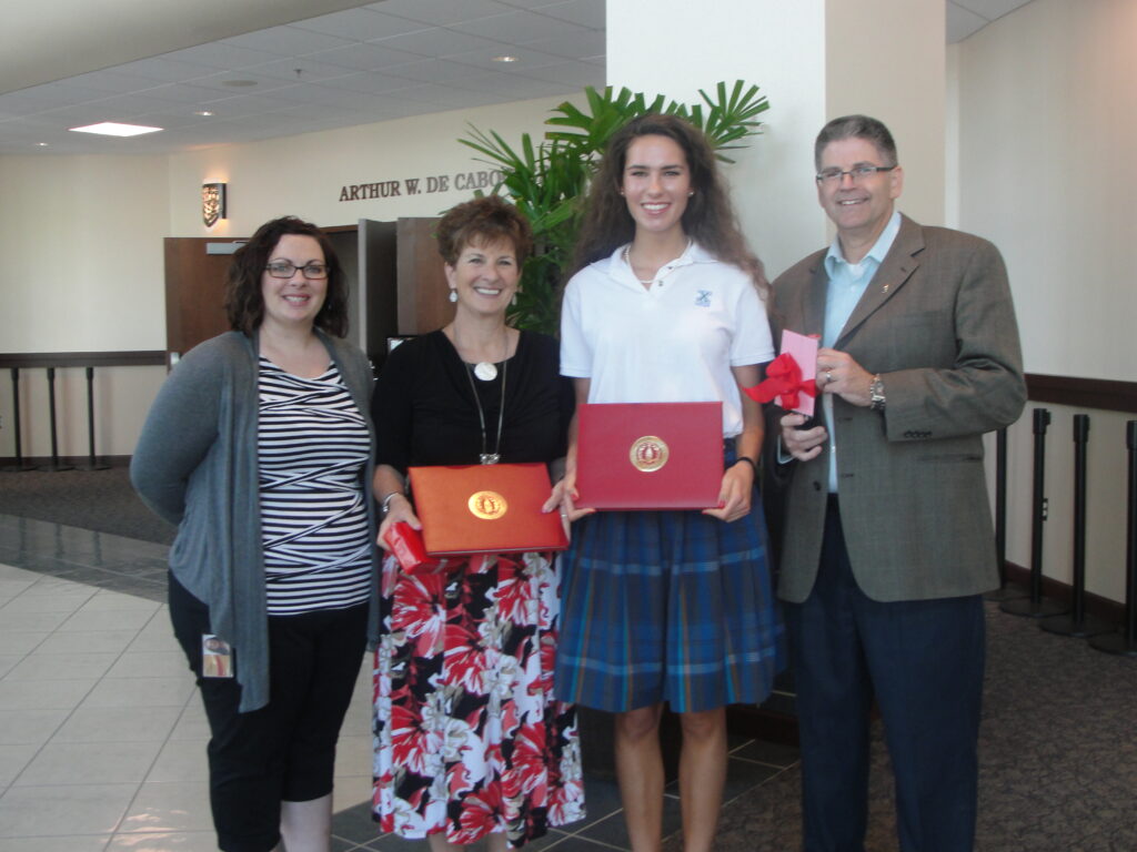 Heidi Lissner, Xavier Dean DeeDee Macrena, senior Sophie Wix and Jeff Monaghan (courtesy of Xavier College Preparatory)