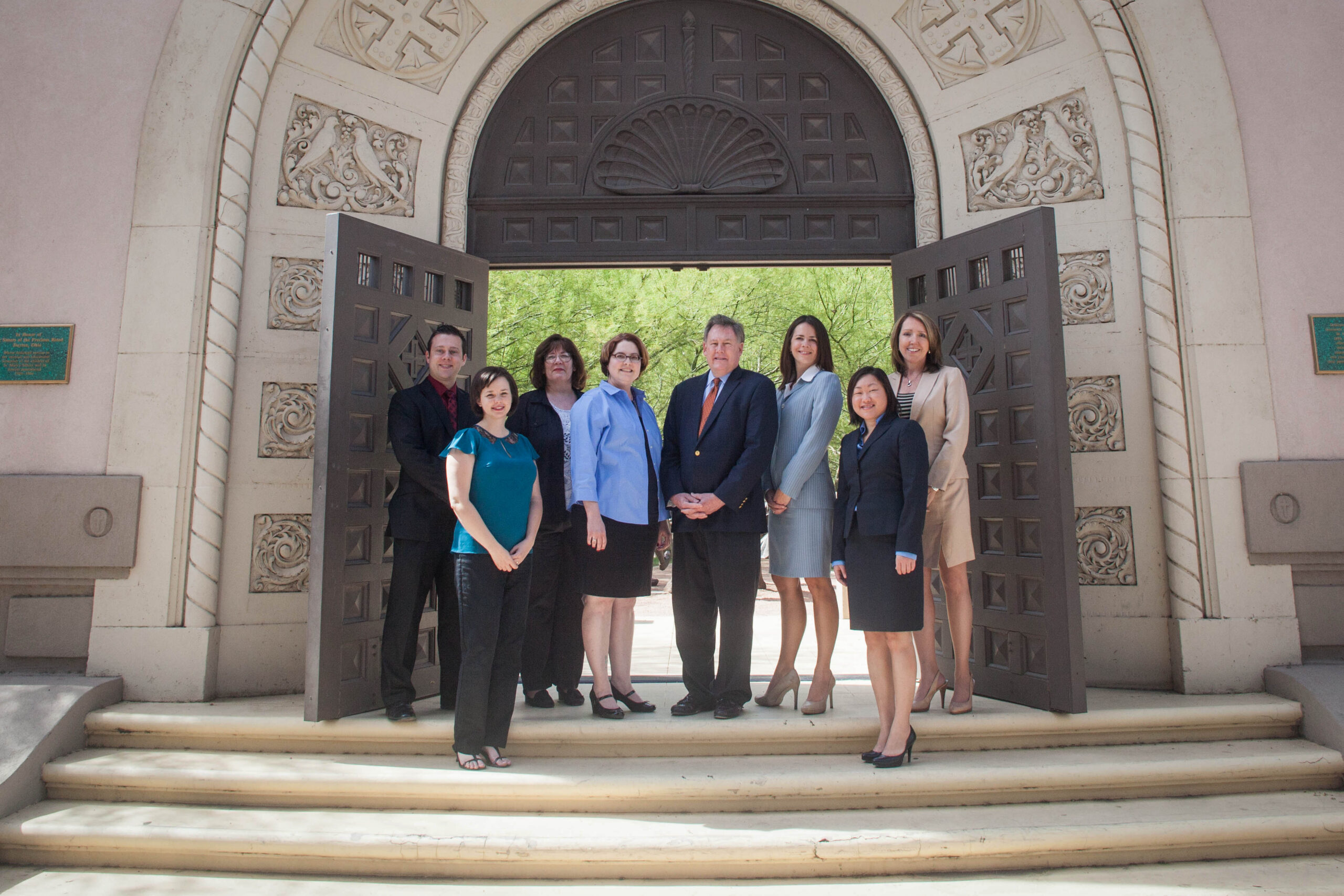 Rick Frisch, fifth from left, heads a team effort to encourage philanthropy as the new president and CEO of the Catholic Community Foundation. (Courtesy Emily Piraino)