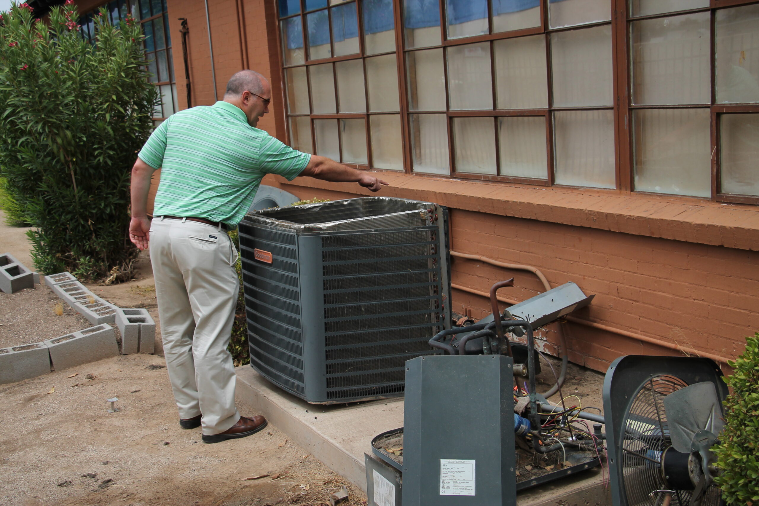 Rob Rogers, principal of St. Catherine of Siena School, hopes air conditioning units damaged by thieves will be replaced before teachers return to campus Aug. 11.