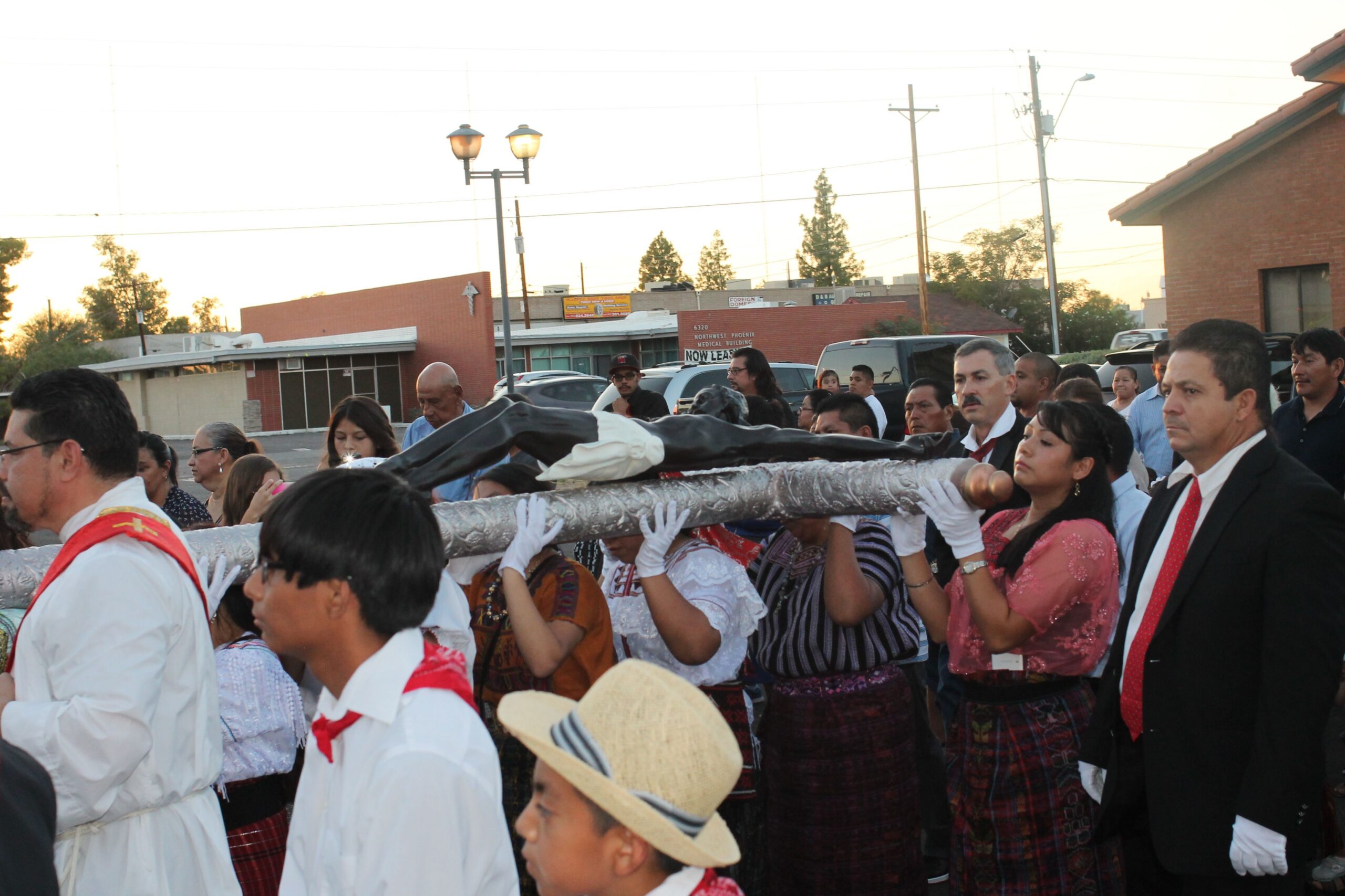 The procession from Smith Hall to Ss. Simon and Jude Cathedral was solemn, with many participants shedding tears.