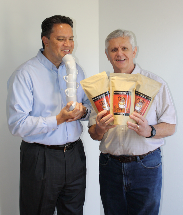Steve Capobres of Catholic Charities and The Refuge and Rodo Sofranac of Café Esperanza show off their locally roasted coffee in a file photo. (courtesy photo)