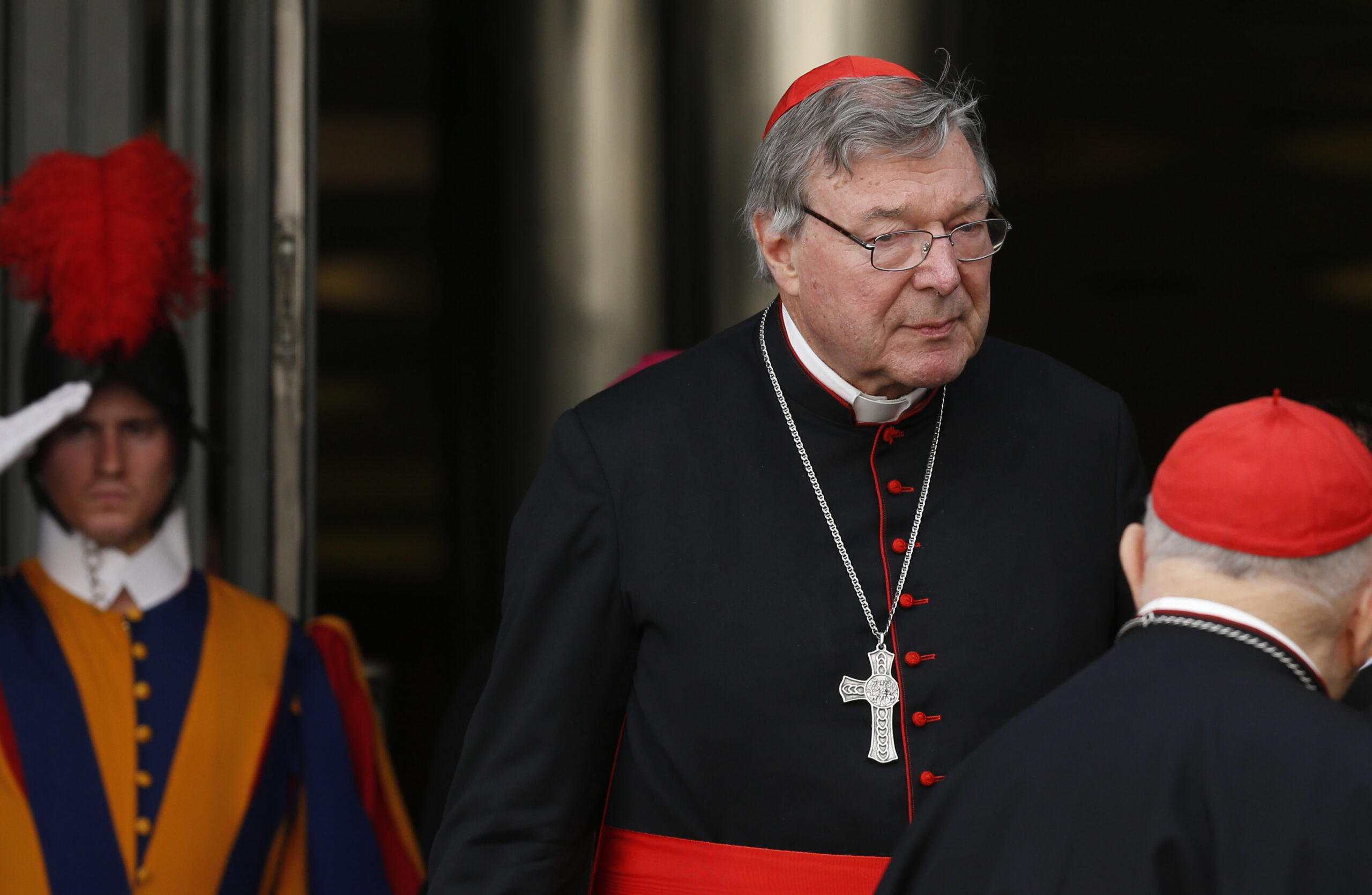 Australian Cardinal George Pell, prefect of the Vatican Secretariat for the Economy, leaves the morning session of the extraordinary Synod of Bishops on the family at the Vatican Oct. 16. In an Oct. 16 interview with Catholic News Service, Cardinal Pell said the synod's midterm report did not accurately represent the views of the synod fathers. (CNS photo/Paul Haring) See SYNOD-PELL Oct. 16, 2014.