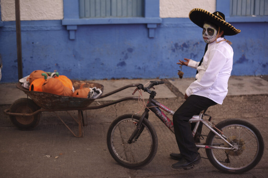 A boy with his face painted as a skull poses for a photo Oct. 26 during the start of the "Las Catrinas" festival, ahead of the Day of the Dead in Cupula, Mexico. The annual Day of the Dead is observed Nov. 1 and 2. (CNS photo/Alan Ortega, Reuters)