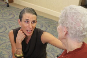 Christy O'Gara makes sure part of her family's monthly visit at La Loma Care Center in Litchfield Park includes personal visits before or after her children's musical performance.  (Ambria Hammel/CATHOLIC SUN)