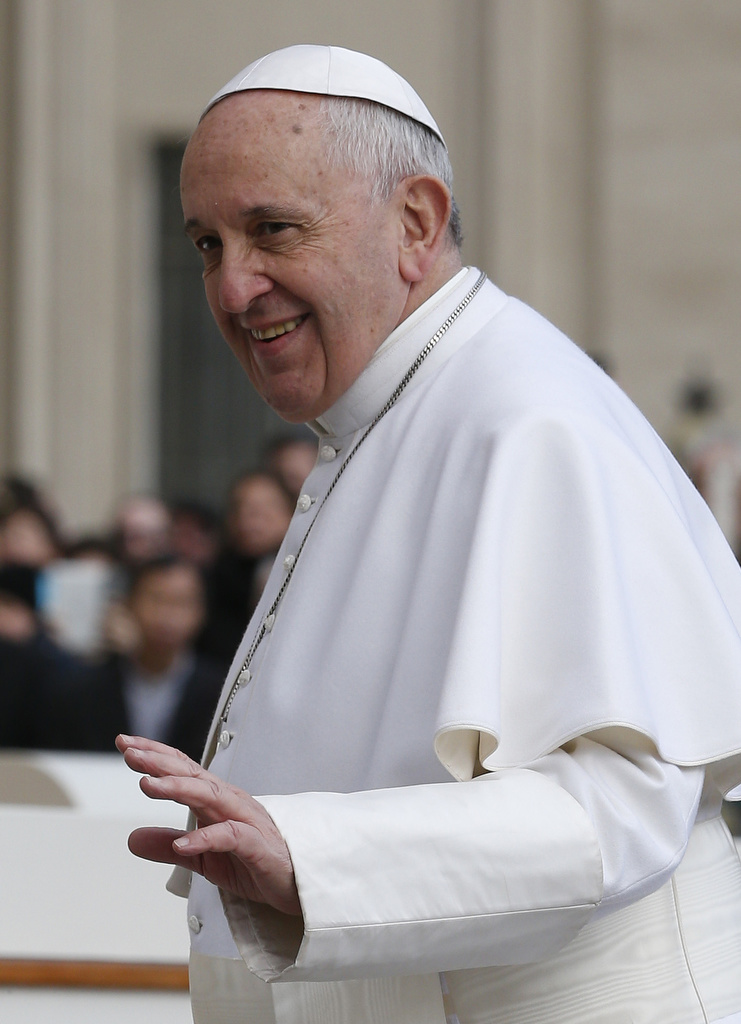 Pope Francis waves as he arrives to lead his general audience in St. Peter's Square at the Vatican March 4. (CNS photo/Paul Haring) 