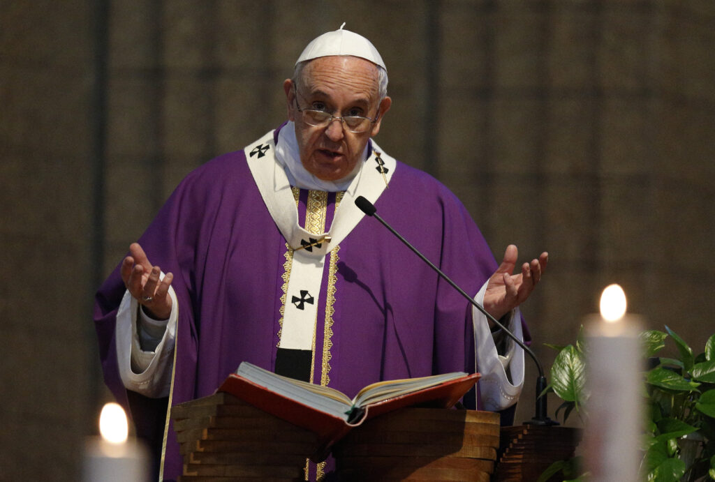 Pope Francis gives the homily while celebrating Mass at St. Mary Mother of the Redeemer Parish on the outskirts of Rome March 8. (CNS photo/Paul Haring)