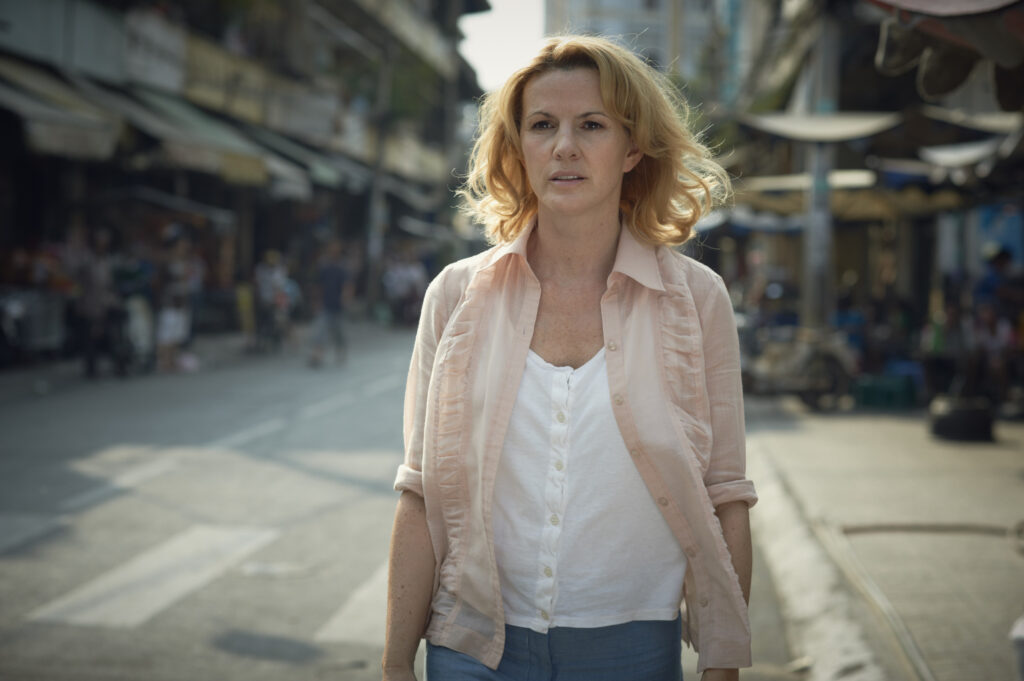Deirdre O'Kane stars in a scene from the movie "Noble." The film, which will debut on 150 screens nationwide May 8, tells the story of an Irish woman with an indomitable spirit who years after raising her own children went to Vietnam to help orphans. (CNS photo/GINSBERG/LIBBY)