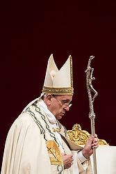 Pope Francis holds his crosier during first vespers of Divine Mercy Sunday in St. Peter's Basilica at the Vatican April 11. Before celebrating vespers, the pope released a 9,300-word document officially proclaiming the 2015-2016 extraordinary Holy Year of Mercy. (CNS photo/Cristian Gennari)