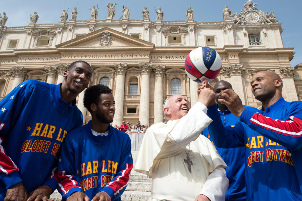 In celebration of their upcoming 90th anniversary tour, the Phoenix-based Harlem Globetrotters met with Pope Francis and named him just the ninth Honorary Harlem Globetrotter in team history on May 6 at St. Peter’s Square. The accolade recognizes an individual of extraordinary character and achievement who has made an everlasting mark on the world. Pictured in the attached image (l-r): Hi-Lite Bruton, Ant Atkinson, Pope Francis, Big Easy Lofton, Flight Time Lang. (Photo © L'Osservatore Romano Foto.)