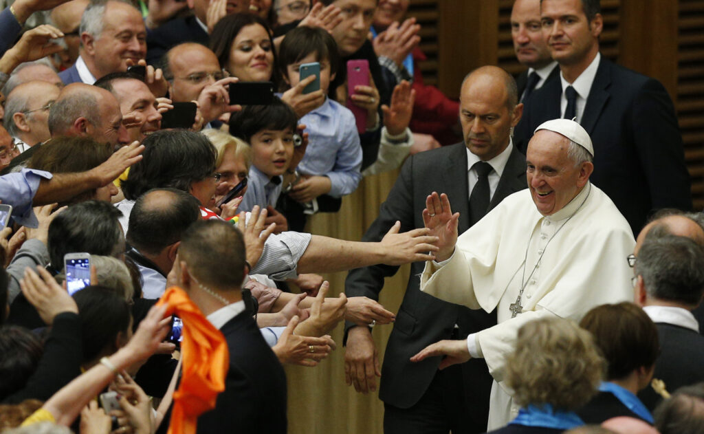 Pope Francis greets people during an audience with members of the Cursillo movement in Paul VI audience hall at the Vatican April 30. (CNS photo/Paul Haring)