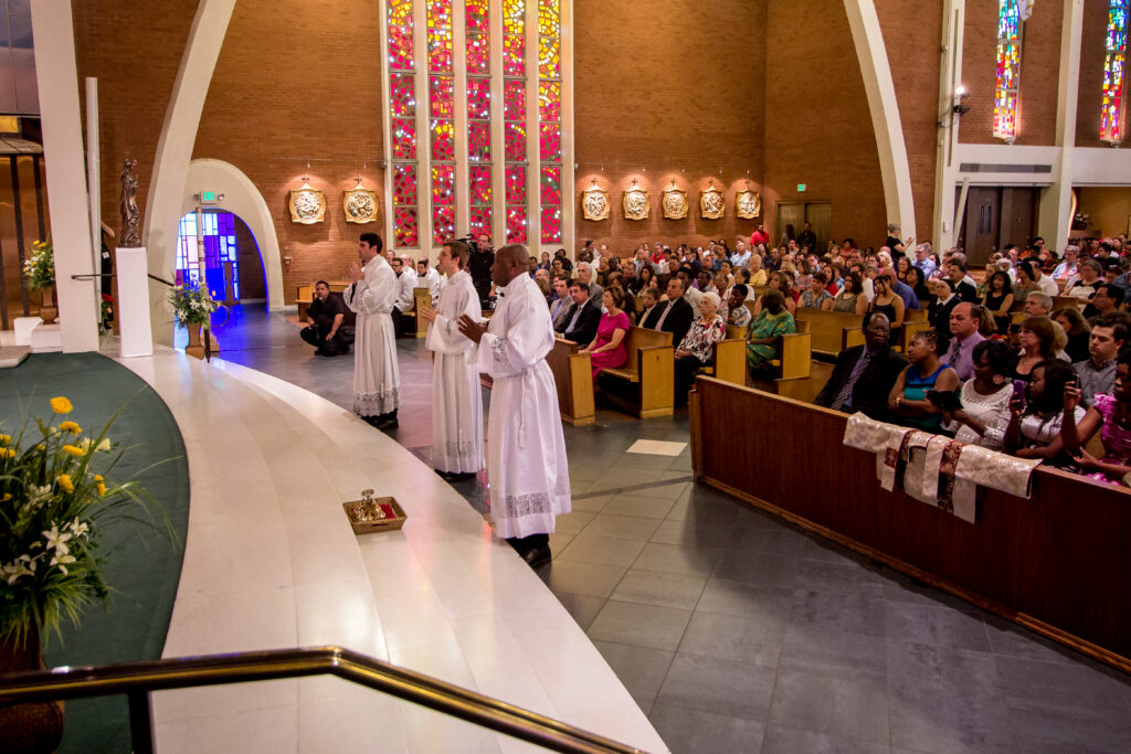 Sheunesu Bowora, Ryan Lee and David Loeffler were ordained deacons on their path to the priesthood during the Diaconate Ordination Mass at Ss. Simon and Jude Cathedral May 31. (Billy Hardiman/CATHOLIC SUN)