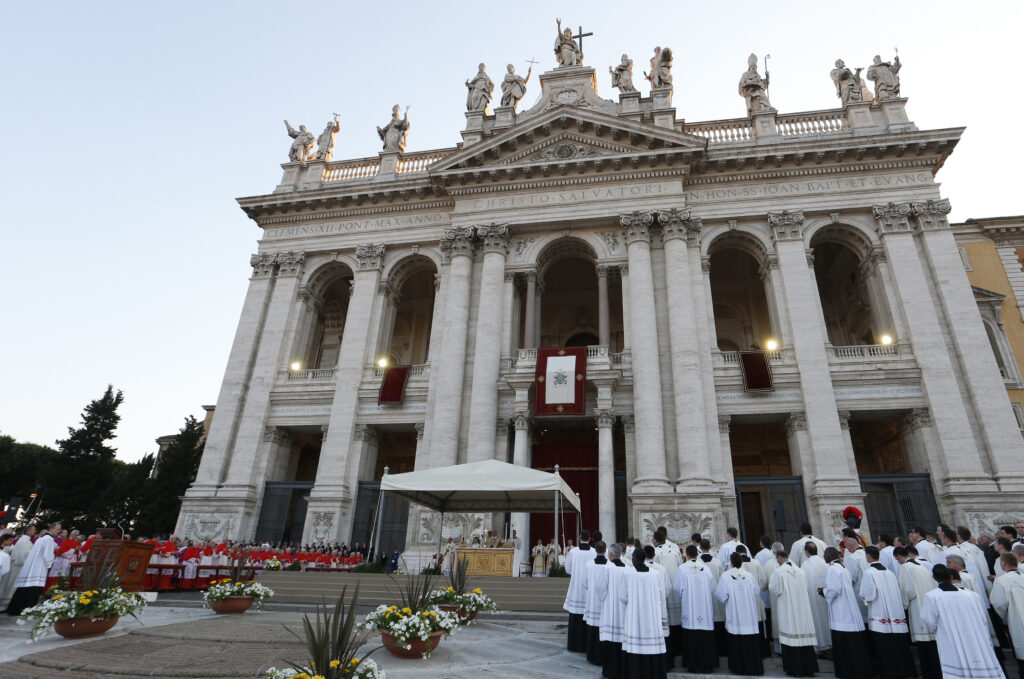 Pope Francis celebrates Mass outside Rome's Basilica of St. John Lateran on the feast of Corpus Christi June 4. (CNS photo/Paul Haring)