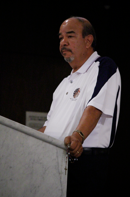 Manny Yrique, who spearheaded the Rosary for the United States of America in 2011, reminds a full Ss. Simon and Jude Cathedral July 4 of the Blessed Mother's claim to this nation from the onset. He said praying the rosary will have the Blessed Mother leading her children to where real change occurs: at the foot of the cross of Jesus (Ambria Hammel/CATHOLIC SUN)