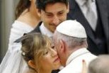 Pope Francis greets newly married couples during his weekly audience in Paul VI hall at the Vatican Aug. 5. (CNS photo/Giampiero Sposito, Reuters)