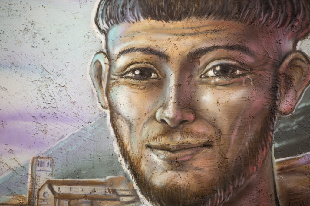 The face of St. Francis of Assisi and other details are seen on a mural at the Franciscan Renewal Center in Scottsdale, Ariz., in this 2014 file photo. Veteran David Campbell, who takes part in a healing program at the center, said of the saint, "I like what he's been through. I like what he's come through." (CNS photo/Nancy Wiechec)