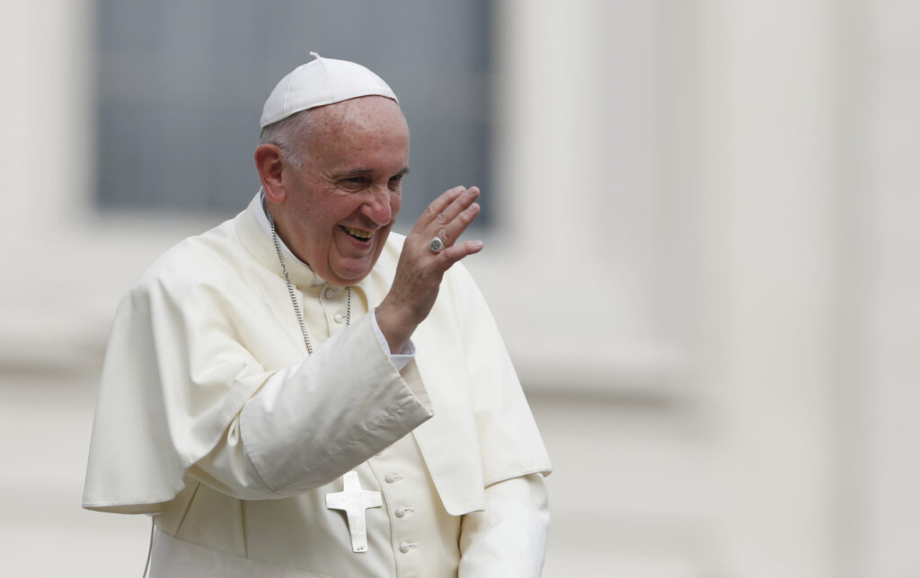 Pope Francis waves as he leaves his general audience in St. Peter's Square at the Vatican Sept. 16. (CNS photo/Paul Haring) 