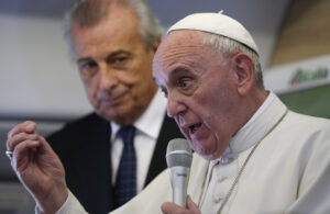Pope Francis speaks to media aboard his flight from Cuba to the United States Sept. 22. (CNS photo/Paul Haring)